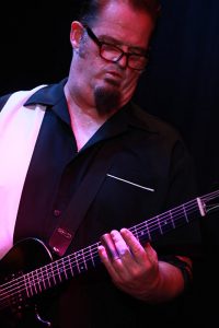 Monti Amundson (guitar, slide guitar, vocals)