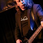 Martin Hofpower (bass, backing vocals)