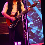 Ralph Derksen as Brian May (guitar)