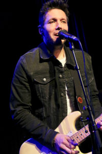 Aynsley Lister (lead vocals, guitars, slide guitar)