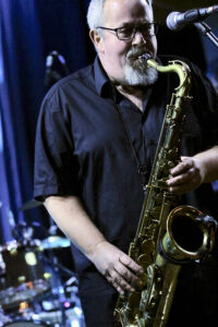 Tommy Scneller (vocals, saxophone)