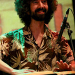 Jason Ribeiro (congas, percussion)