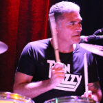 Stevie Alphenaar (drums, backing vocals)