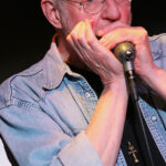 Steve Baker (vocals, harmonica)