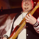 Philipp Pfetzing (bass, backing vocals)