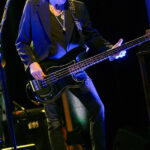 Martin Engelien (bass, backing vocals)