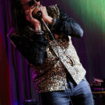 Dennis Gruenling (harmonicas, lead vocals, backing vocals)