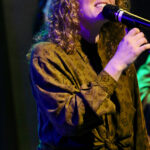 Djoly Janssen (lead vocals, cabasa, backing vocals)