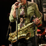 JB Biesmans (vocals, saxophone, harmonica)